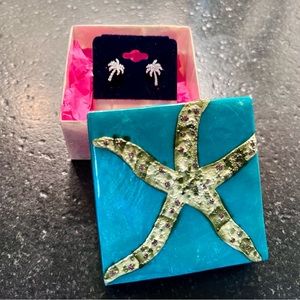 Sparkling rhinestone palm tree earrings with starfish capiz shell box.